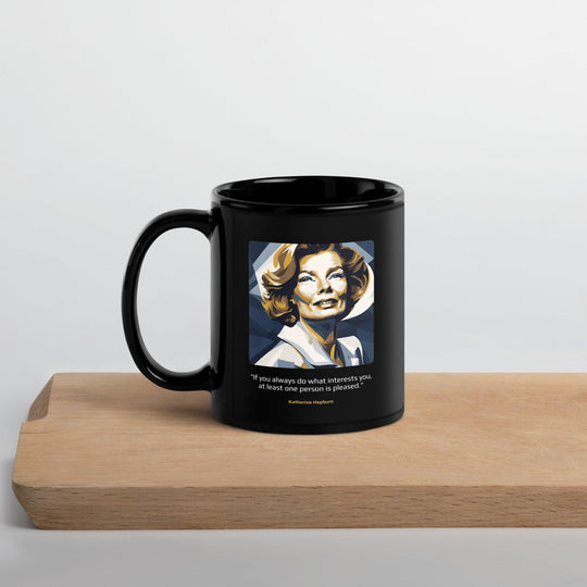 Black Glossy Mug: "If you always do what interests you, at least one person is pleased." (Hepburn) - LeadershipQuotes.com