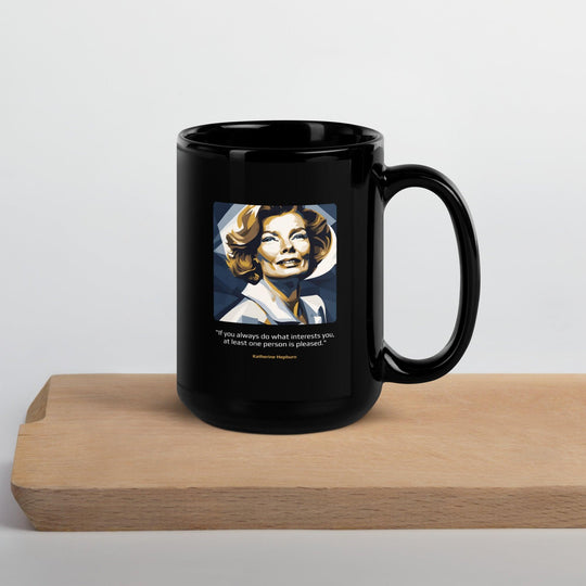 Black Glossy Mug: "If you always do what interests you, at least one person is pleased." (Hepburn) - LeadershipQuotes.com